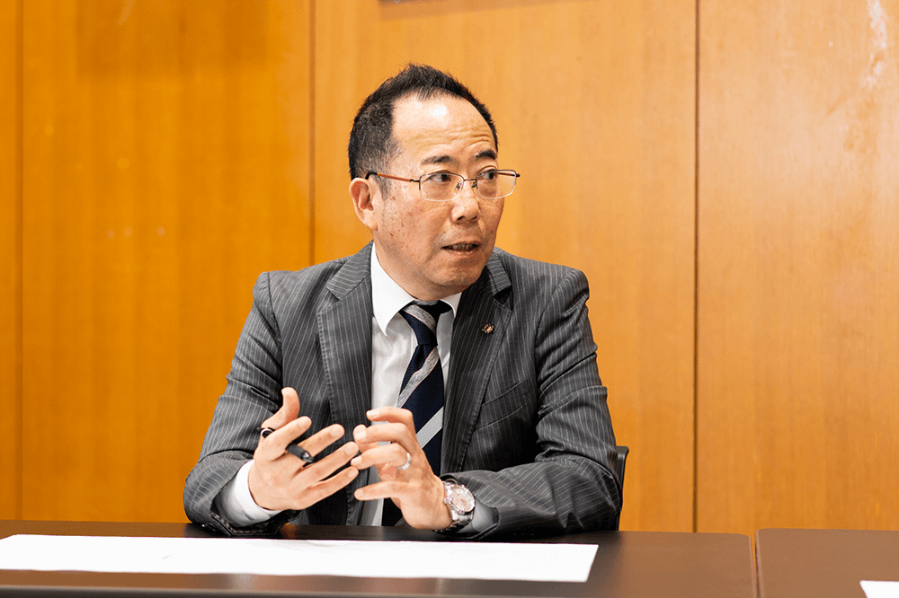 のむら産業株式会社 常務取締役 西澤 賢治様